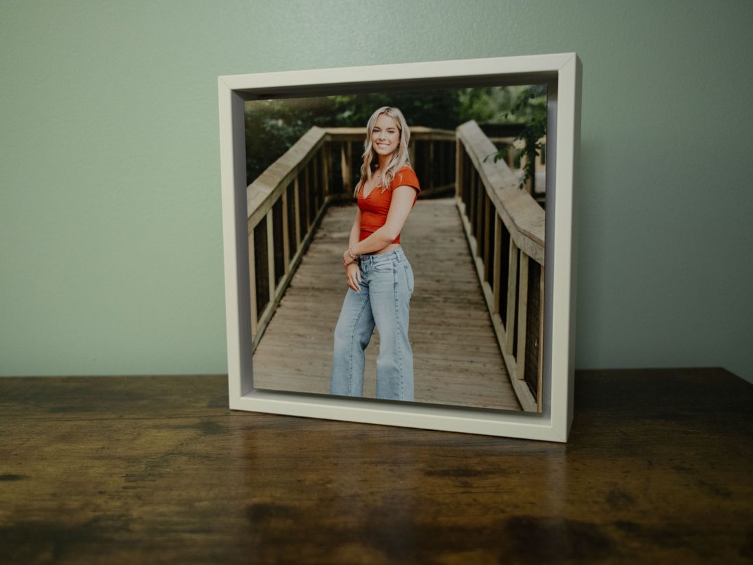 Senior portrait in a white float frame tabletop display