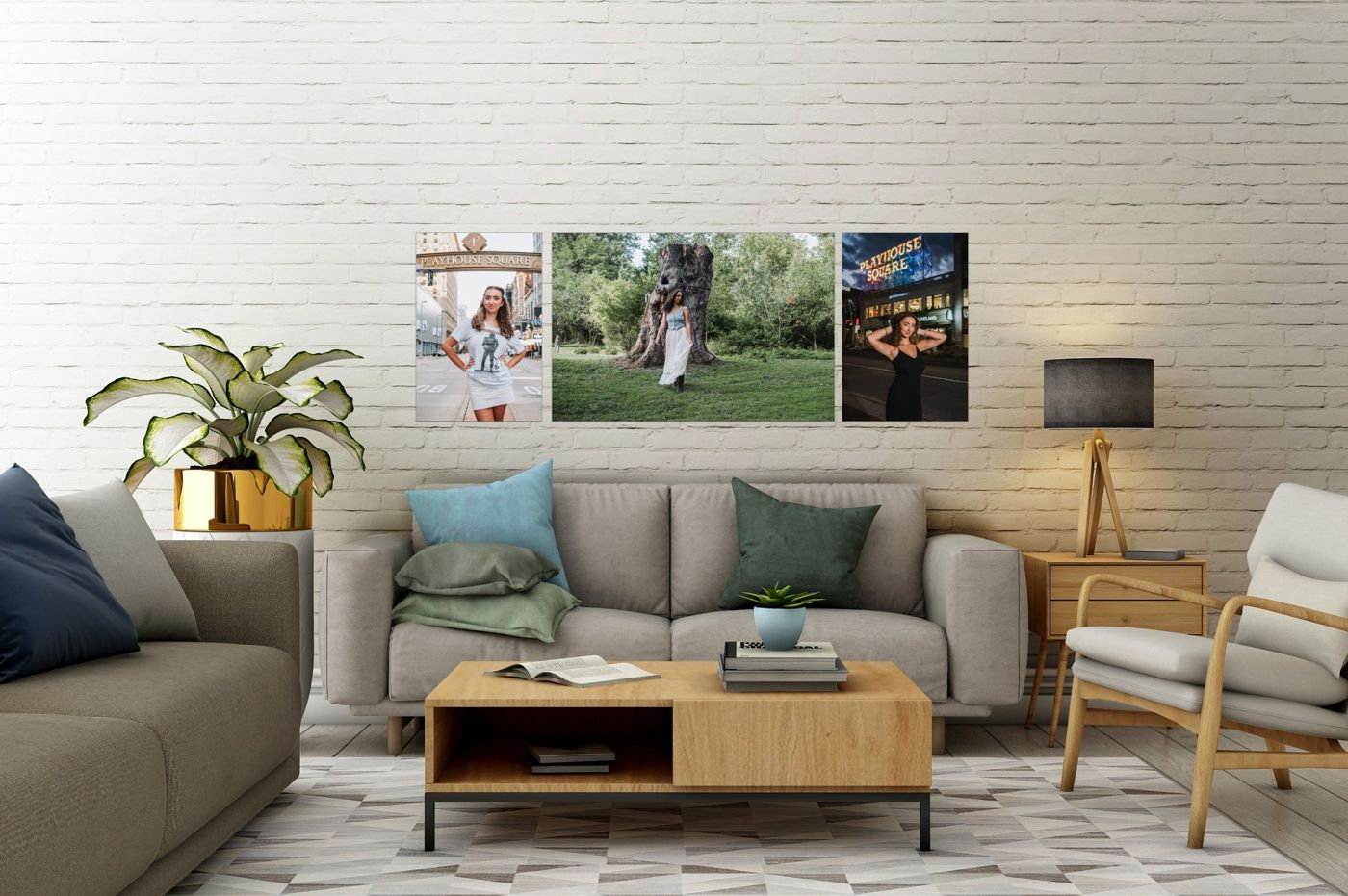 Three senior portraits displayed as a wall art collection above a sofa